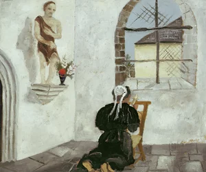 Bretonische Frau beim Gebet